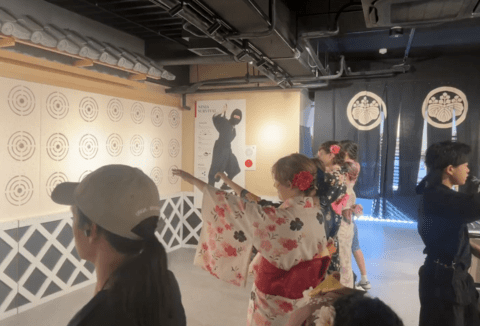 students throwing ninja stars