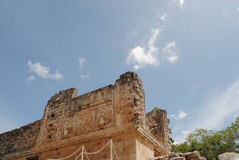 The carvings of Chac seen on one of the ancient buildings of Uxmal