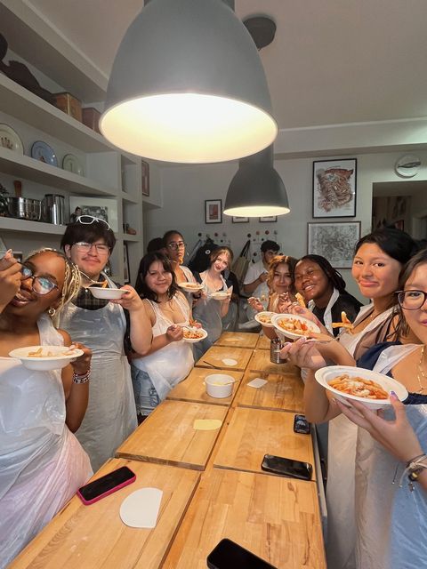 students cooking together in Rome on high school summer program