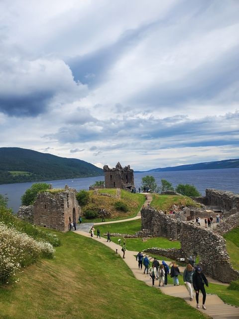 Study abroad students walking on the banks of Loch Ness 