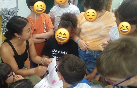 Marissa with students in classroom