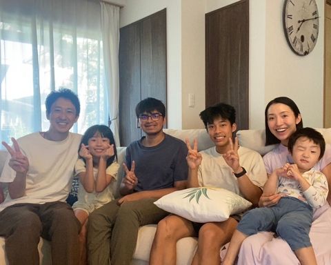 study abroad student with host family