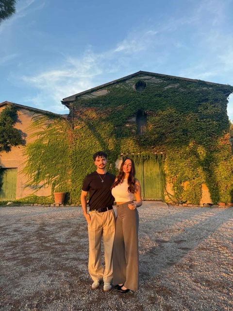 Marta and Sam pose for a photo.