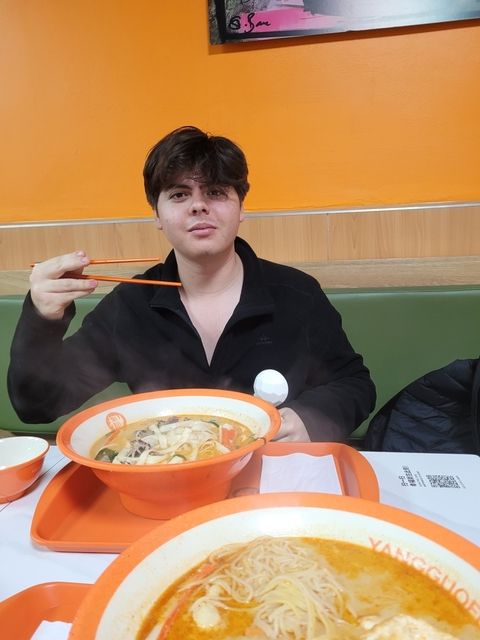 Eating Chinese food near the Christmas market