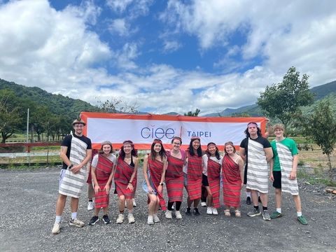 Students on program in Taipei posing with CIEE banner