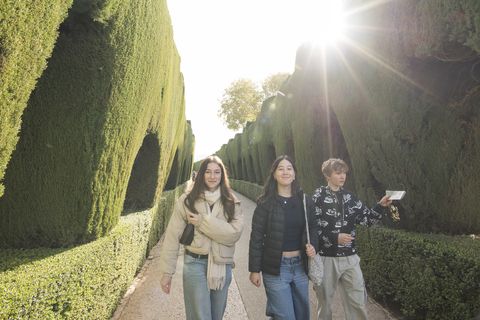 Students exploring gardens in Seville while on high school study abroad program
