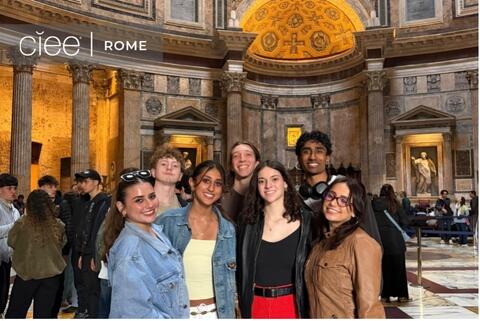 A group of students stands together in a historic-looking Cathedral with a "CIEE Rome" logo at the top of the picture