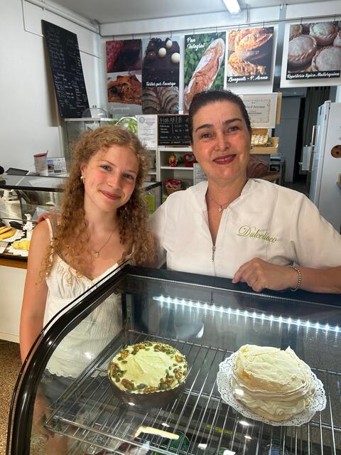 student with bakery owner in palma