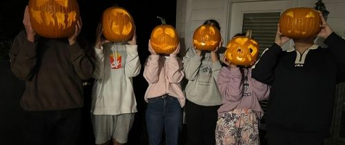 Carve pumpkins with other exchange student 