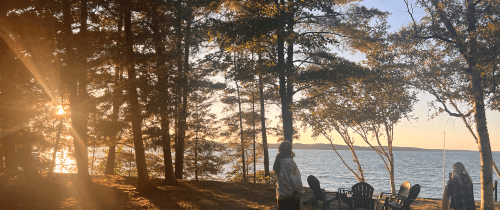 Sunsetting behind a lake