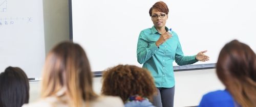 Professor giving lecture to class