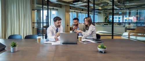 employees meet together in office