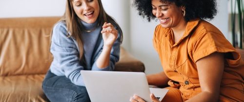 two women meeting with laptop