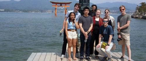 tokyo students on dock by ocean