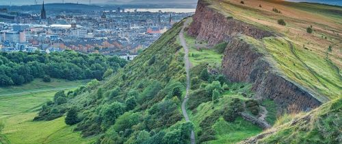 Edinburgh Salisbury Crags in Holyrood Park and downtown Edinburgh