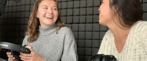 students smiling in studio europe