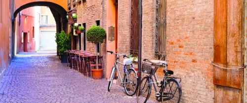 Bicycles in an alley in Ferrara, Italy