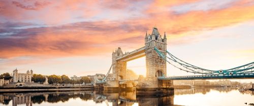 London bridge in an orange and purple sunset