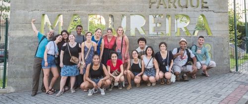 wisconsin student group with sign abroad