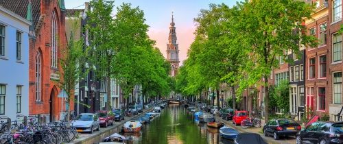 amsterdam canal sunset buildings