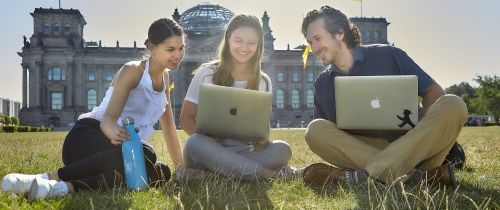students berlin laptop lawn