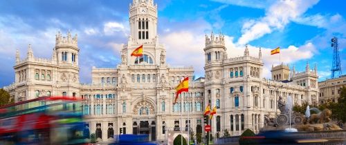 madrid traffic circle building flags