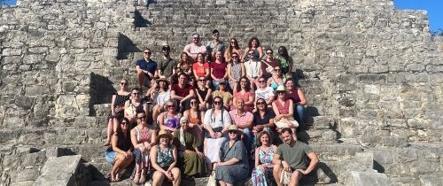 Group photo of program leaders in Merida on steps