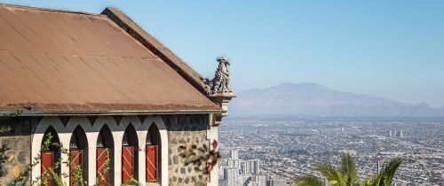 santiago dr gargoyle over city