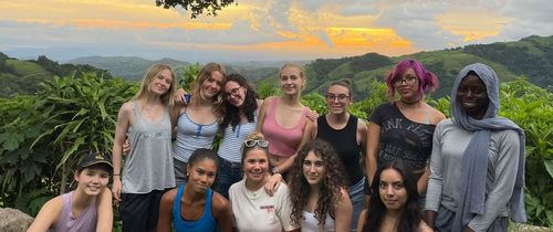 high school students in forest of Montverde at sunset