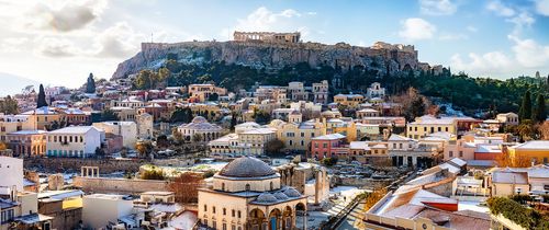 athens-snow-dusted-rooftops-acropolis-background