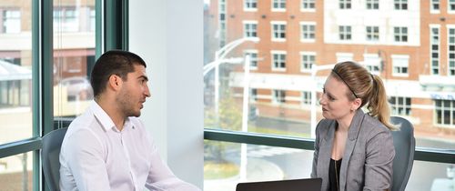 collaborating-meeting-with-co-workers-office