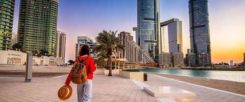 abu-dhabi-woman-backpack-walking-reem-island