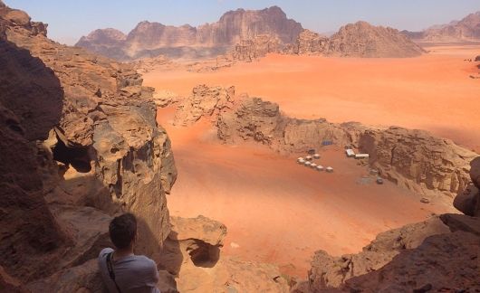 student in amman jordan overlooking desert