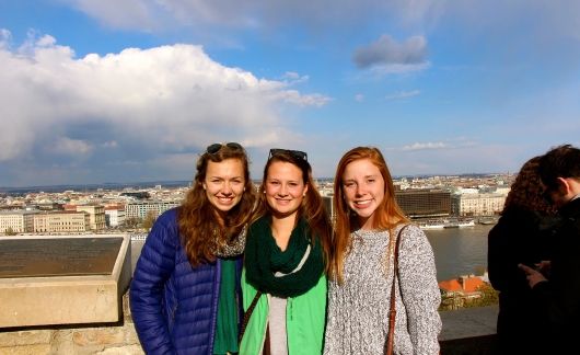Gap Year Abroad students smiling in Seville by the water