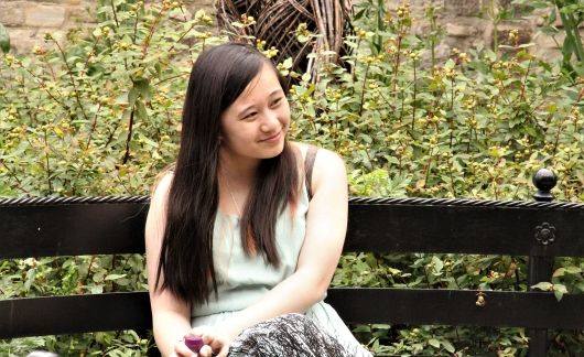 High school student sitting on a bench in London