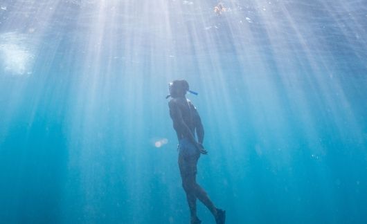 High school student snorkeling in Australia