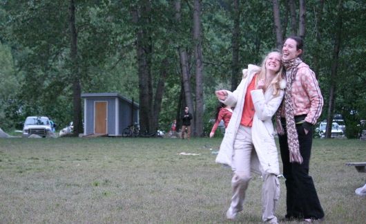 two female colleagues working together laughing