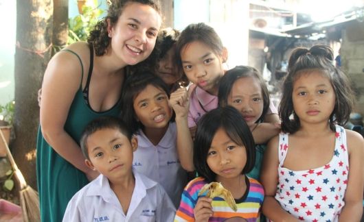 Teacher and students posing for a photo