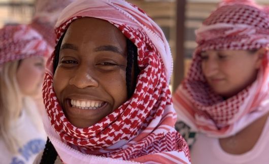 amman desert excursion study abroad female student headwrap