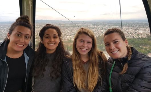four girls on cable car in buenos aires