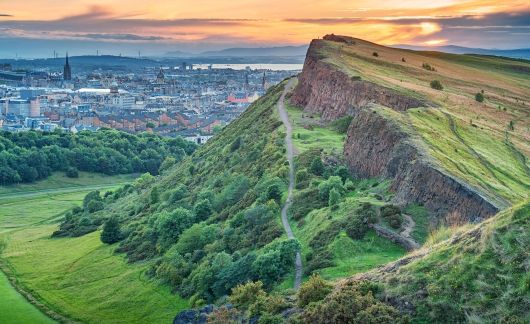 Edinburgh Salisbury Crags in Holyrood Park and downtown Edinburgh