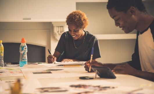 frederick douglass global fellows working on posters