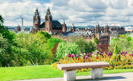 downtown bench glasgow scotland flowers