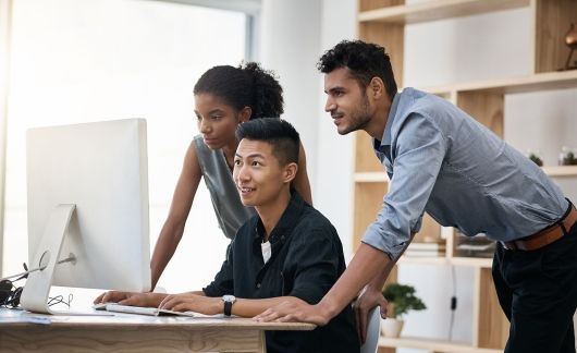 Interns on computer