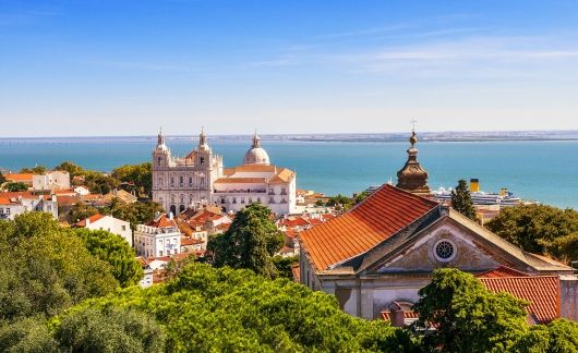 coastline of lisbon sunny day houses