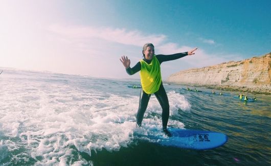 student surfing abroad in lisbon portugal