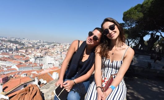 lisbon city overlook two study abraod students smiling