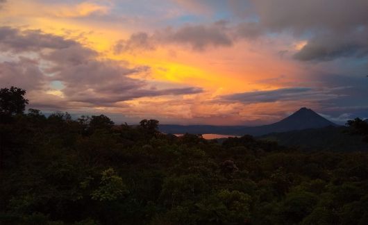 sunset in costa rica forest mountains