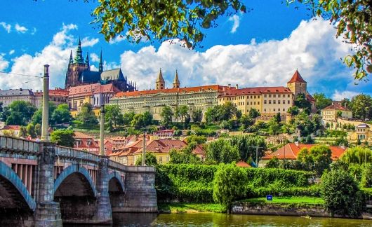 prague river bridge church hill