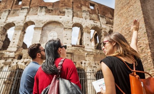 rome colosseum group looking up